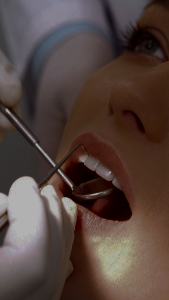 A dentist working on a patient.